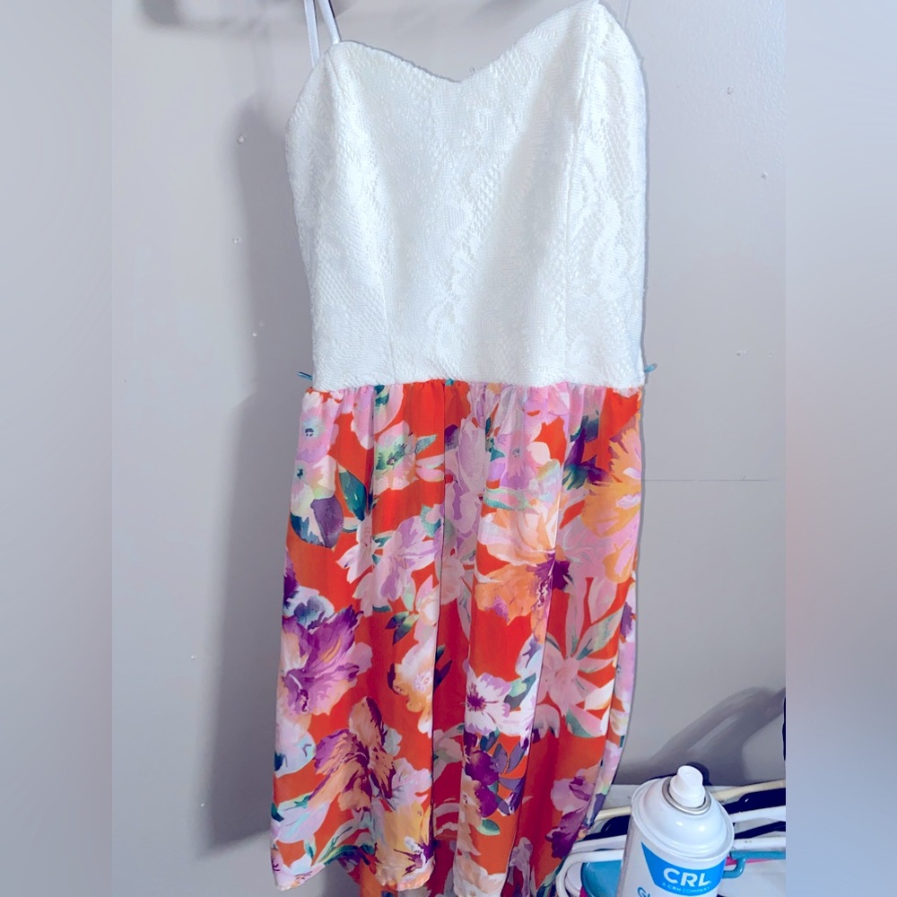 Dress size small , practically brand new. Just been hanging in my closet